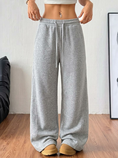 Women’s cotton wide-leg sweatpants with an elastic drawstring waist and side pockets