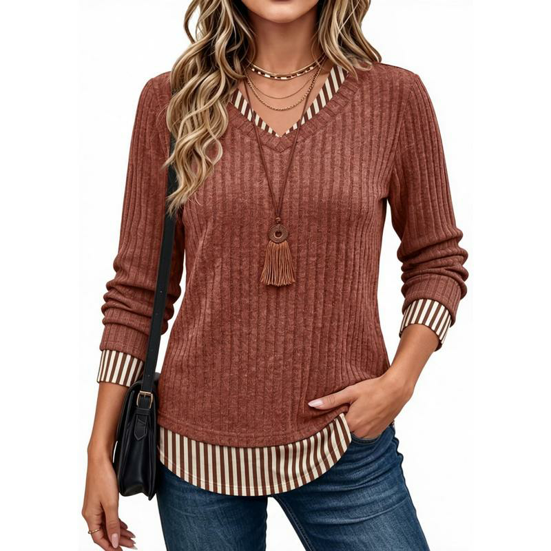 Rust-colored ribbed tunic with striped accents
